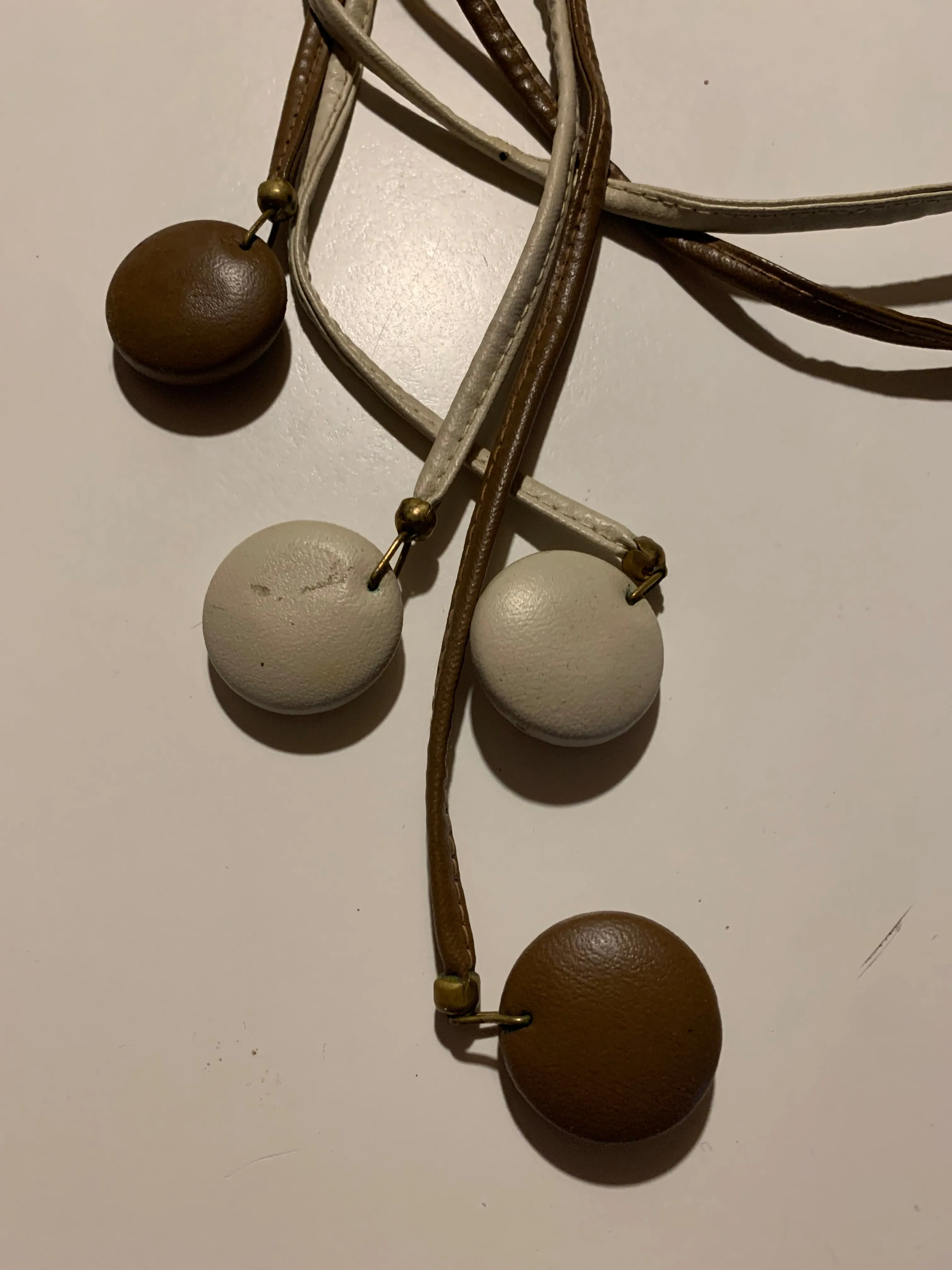 Set of Leather Cord Belts with Leather Circle Fobs circa 1980s